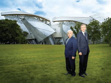 Bernard Arnault, CEO, LVMH and architect Franck Gehry in front of Foundation Louis Vuitton in Paris