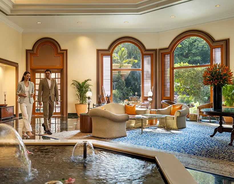 Couple walking in luxurious lobby of The Oberoi Bengaluru. Couple walking in luxurious lobby of The Oberoi Bengaluru.