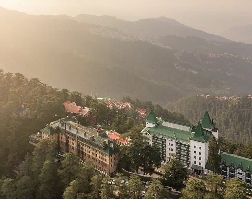 Aerial view of forested hills, resembling The Oberoi Cecil, Shimla. Aerial view of forested hills, resembling The Oberoi Cecil, Shimla.